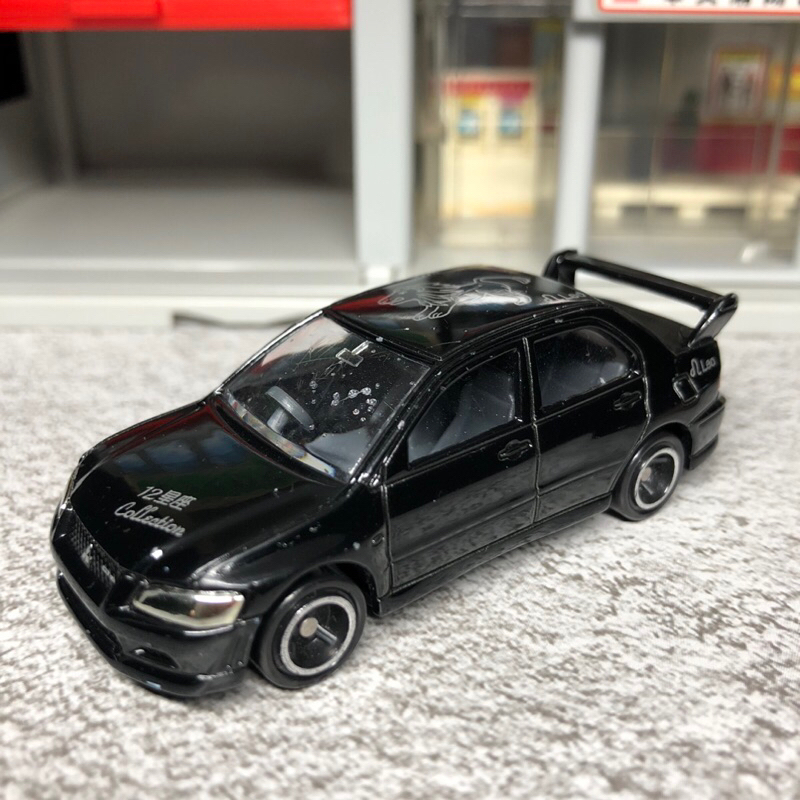 how***owo客訂賣場  Tomica 12星座車 evo VII 獅子座