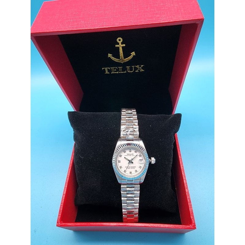日本品牌TELUX鐵力士，豪仕型女錶全白錶帶，日本原裝石英機芯，不鏽鋼錶殼，不鏽鋼錶帶，錶帶摺疊式錶扣