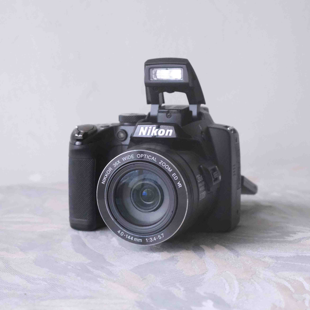 Nikon CoolPix P100 早期 類單眼 CMOS 數位相機(廣角 26倍變焦 90度翻轉螢幕)
