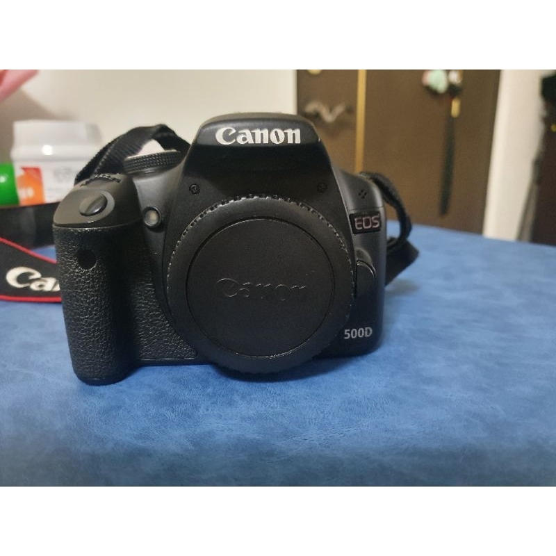 Canon EOS 500D 單眼相機機身，附揹帶.電池及充電器