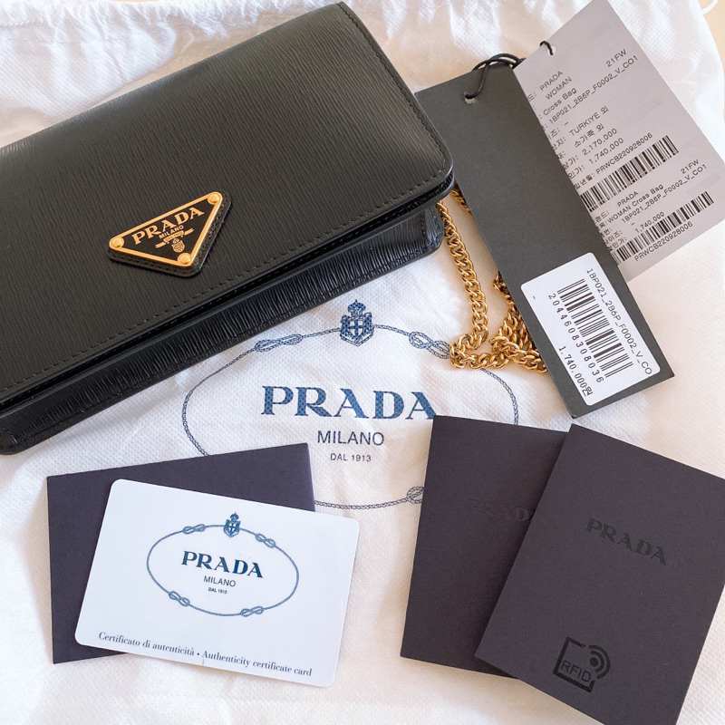 Prada 1BP021 精品 黑牛皮 三角logo WOC 金鍊 協背包 肩背包