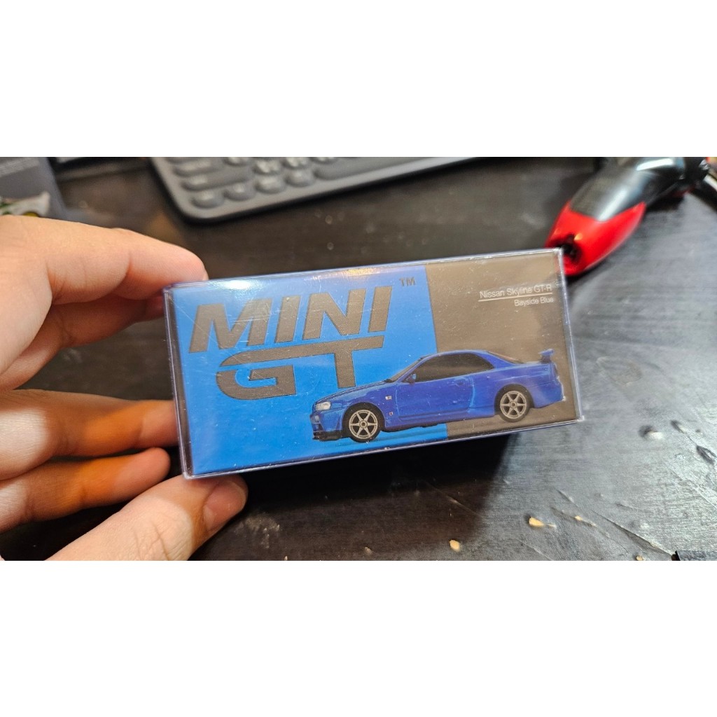 MINI GT #341 Nissan Skyline GT-R (R34) V-Spec II Bayside Blu