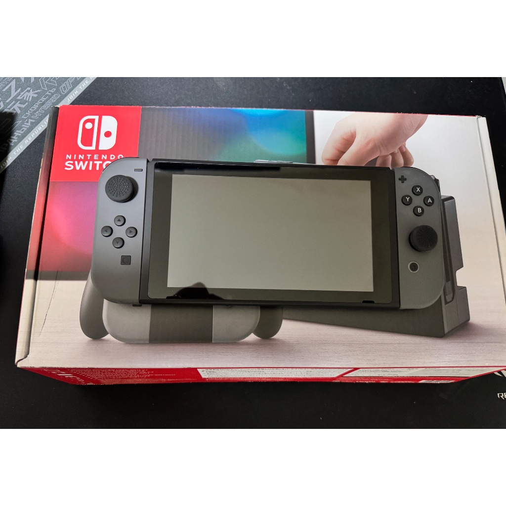 任天堂 Nintendo Switch 主機一般版 黑色 + 多附一組原廠Joy-Con (黃+紫) + 原廠主機保護套