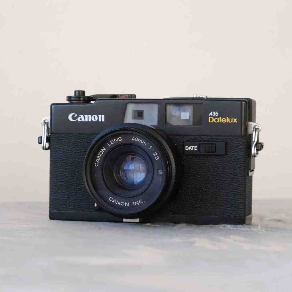 canon A35 datelux 大光圈 旁軸 底片 相機 (有閃燈)