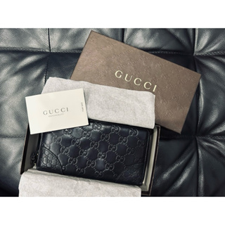 Gucci 經典Signature系列GG壓紋銀色金屬LOGO牛皮拉鍊長夾