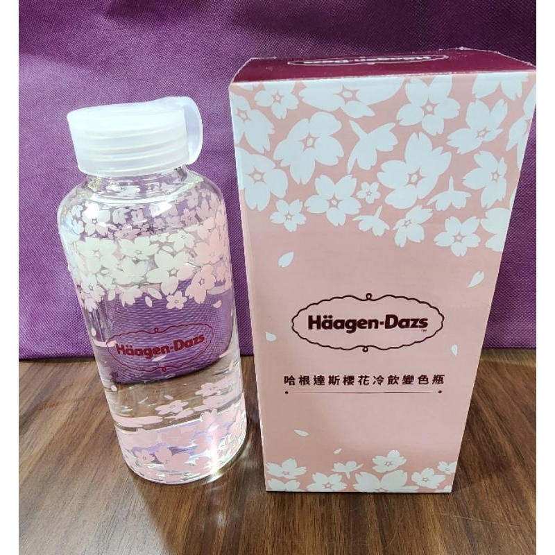 哈根達斯櫻花變色瓶(玻璃材質，裝入冷飲變粉色櫻花，手溫即變回白色)