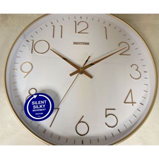 RHYTHM CLOCK 日本霧玫瑰金框白麵立體浮阿拉伯數字刻劃靜音掛鐘 型號:CMG613NR06{神梭鐘錶}