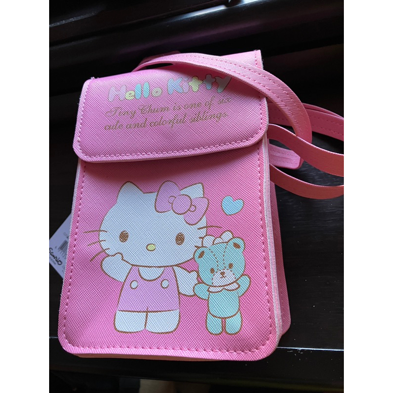 全新商品Hello Kitty直式背袋萬用包