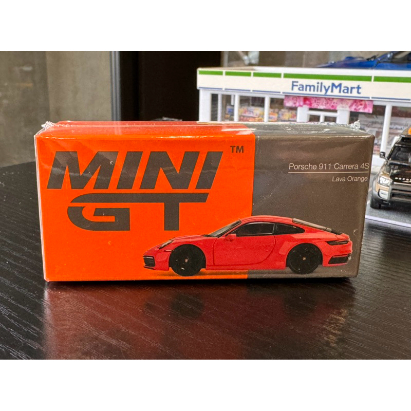 MINI GT #371 Porsche 992 Carrera 4S Lava Orange