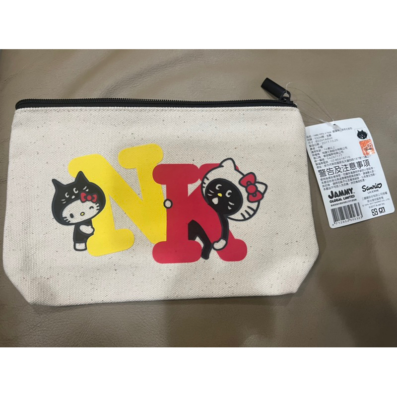 二手近全新✨ 正版 Hello Kitty x NYA  黑貓 驚訝貓 變身系列 帆布 化妝包 收納包