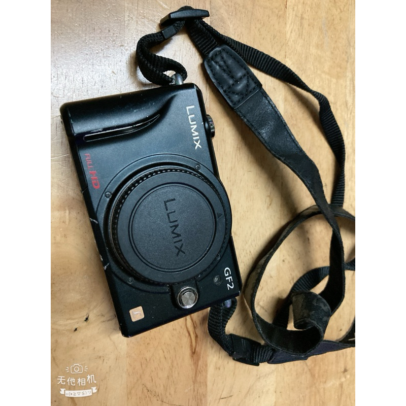 (零件品）二手國際牌panasonic(dmc-gf2)放入電池不過電！無法開啟！當零件賣（空機身一台！其他配件都沒有）