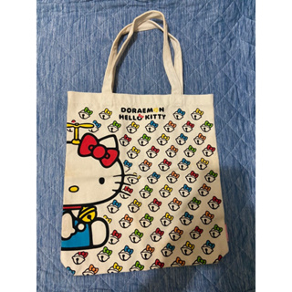 哆啦a夢小叮噹 x Hello Kitty凱蒂貓滿版鈴鐺 帆布手提袋/購物袋 托特包 買菜包