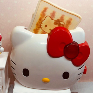 日本帶回來的早期Hello Kitty麵包機造型的玩具還有兩片吐司自己裝電池