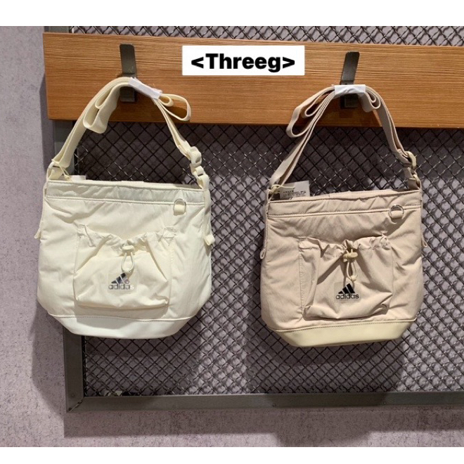 Threeg🐲ADIDAS 隨身包 水桶包 拉鍊袋 可調節背帶 D形環 米白 JF1209 奶茶 JF1208