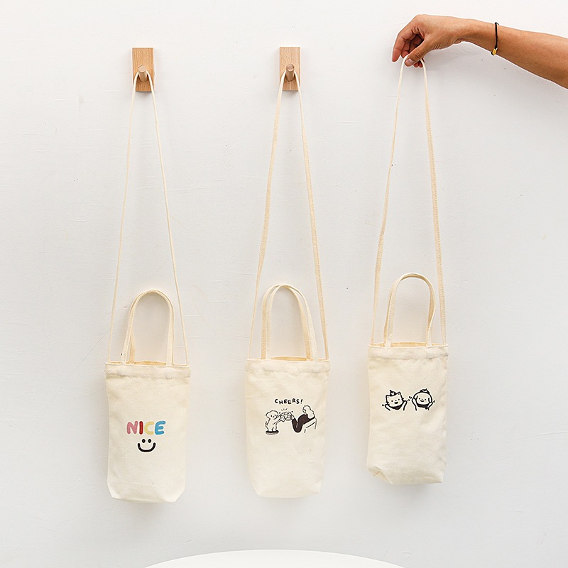 (⁠◕⁠ᴗ⁠◕⁠✿⁠美好日常)奶茶袋飲料袋日系微笑手提斜挎帆布袋水杯水壺手提袋便攜簡約創意杯袋水壺袋雜物