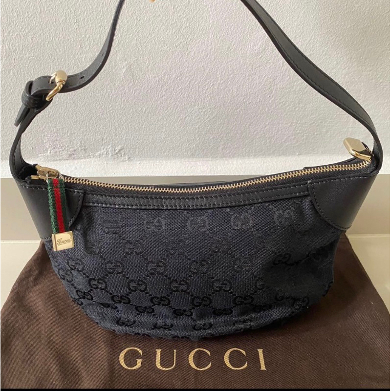 GUCCI 古馳手提包GG Canvas 帆布包 手拿包 水餃包 半月包