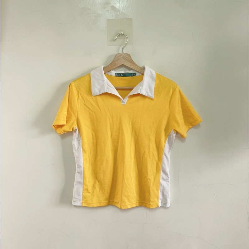 極新 黃色拼接開襟運動排汗衫 231110（短袖上衣）