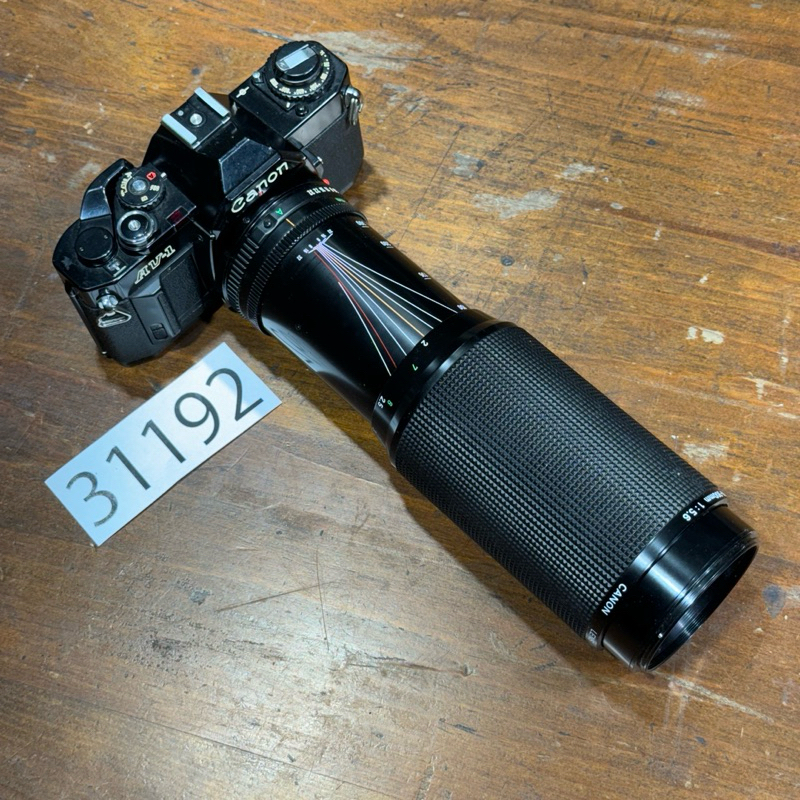 Canon AV-1單眼底片相機加100-300mm NEW FD口手動變焦鏡頭
