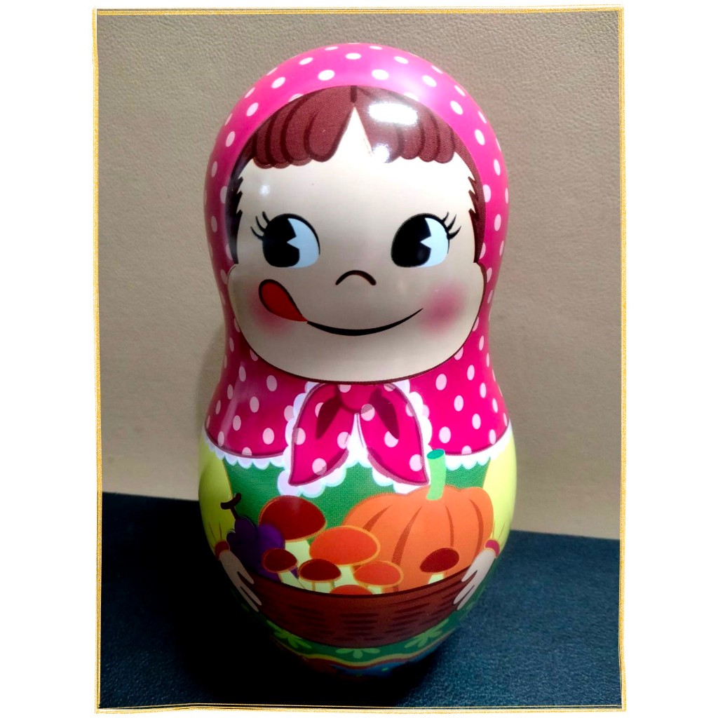 日本帶回PEKO早期正版絕版現貨-全新已拆封-不二家牛奶妹俄羅斯娃娃鐵罐/人形罐(中)-南瓜松鼠-高約14.5公分