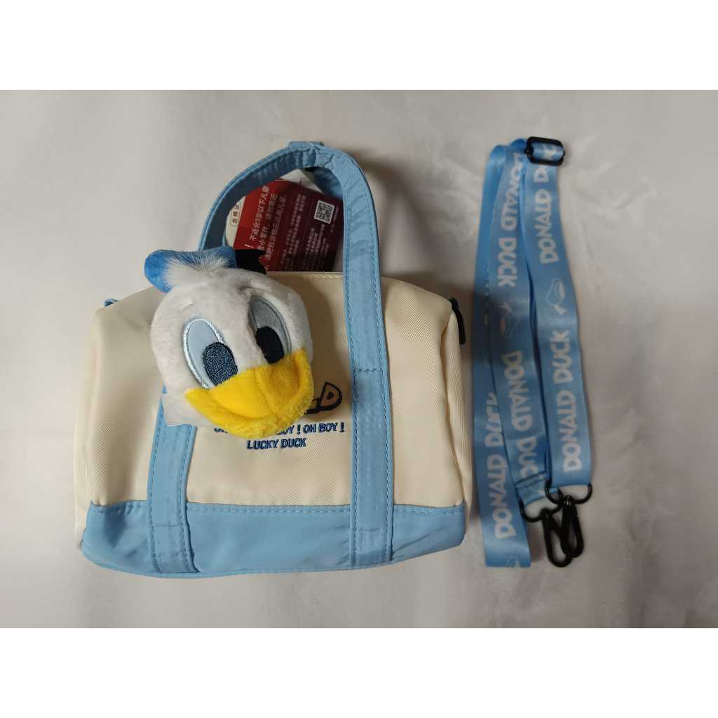 (正版)迪士尼 唐老鴨圓筒斜挎包 Disney正版 唐老鴨側背包斜背包 附唐老鴨吊飾
