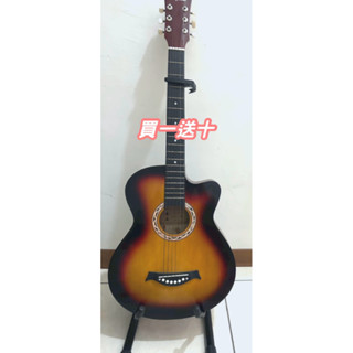 售吉他(二手） 送教學書、吉他線（全新）、吉他袋子、背帶（全新）、吉他架、調音器、撥片、變調夾、繞線器、譜架（全新）