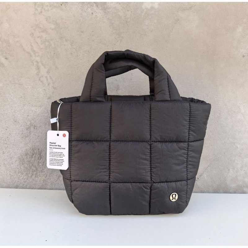 美國Lululemon lululemon 羽絨澎澎手提包 側背包 防潑水材質 輕便 大容量 上班族通勤包 5L