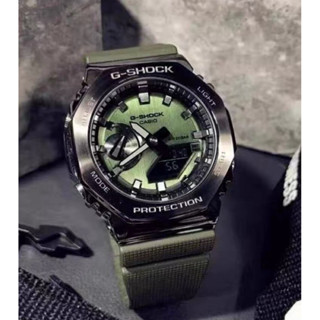 代購CASIO卡西歐G-SHOCK Gm2100 金屬金框 黑錶帶 綠面 手錶 石英 潮流 指標