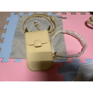 二手 近全新 CHARLES & KEITH Koa加長型腕包 米色 可放手機 小ck 手機包 萬用包 隨身包