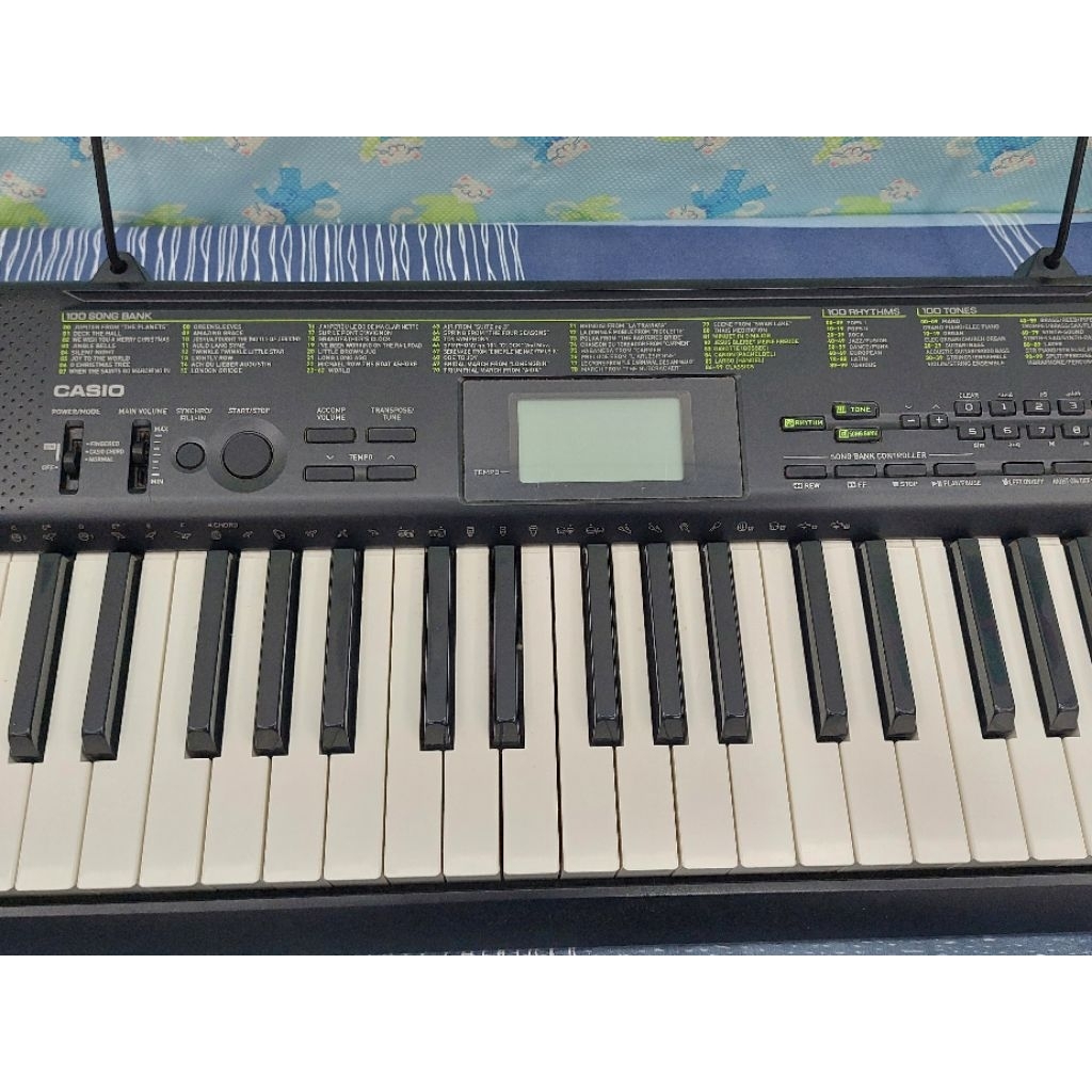 CASIO 二手61鍵電子琴附電源線、琴譜架