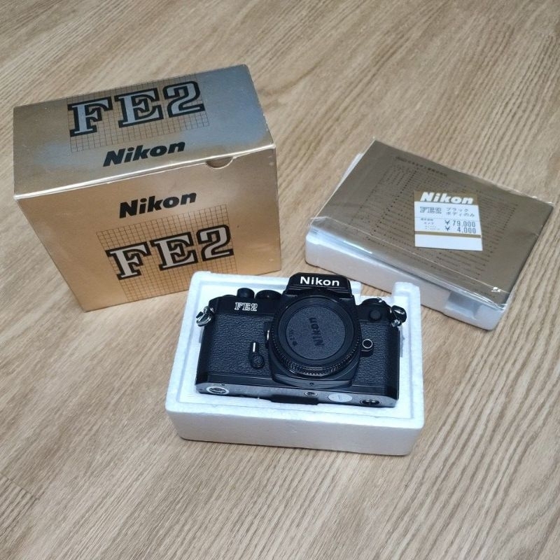 售自用二手九成新Nikon FE2黑色底片相機(FM2兄弟機，稀有蜂巢式快門簾幕)
