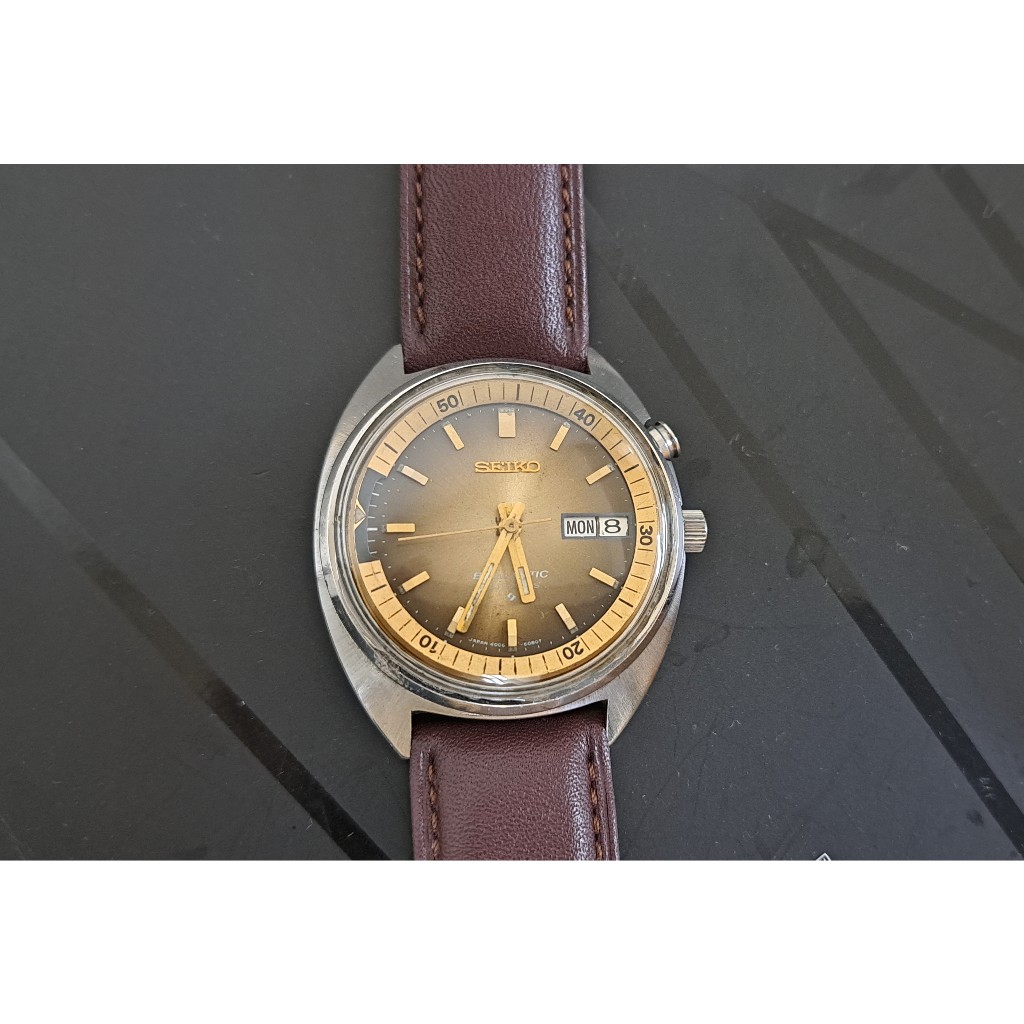 日本原裝 SEIKO精工鬧鈴錶,星期日期顯示,原裝龍頭.不鏽鋼自動機械錶