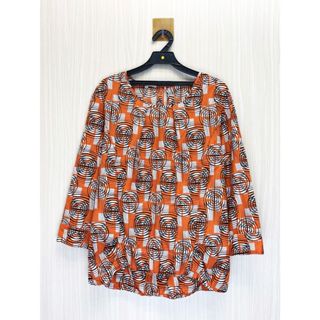 獨身貴族 專櫃 橘色視覺線條長袖上衣 (編號250301120