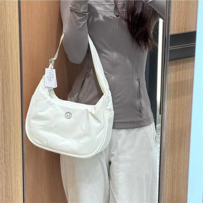 免運代購加拿大新款 4L潮牛角包單肩包腋下包餃子包