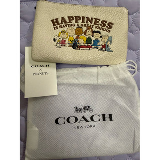 COACH X PEANUTS 史努比手拿包-全新現貨