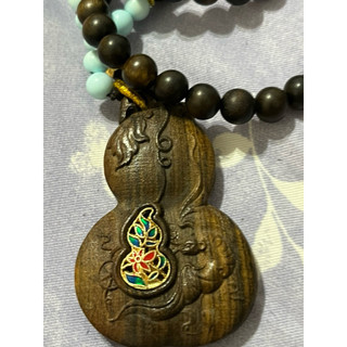 黃金檀108顆加一葫蘆墜子，寓意棒