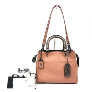 coach 粉色皮革手提肩揹包