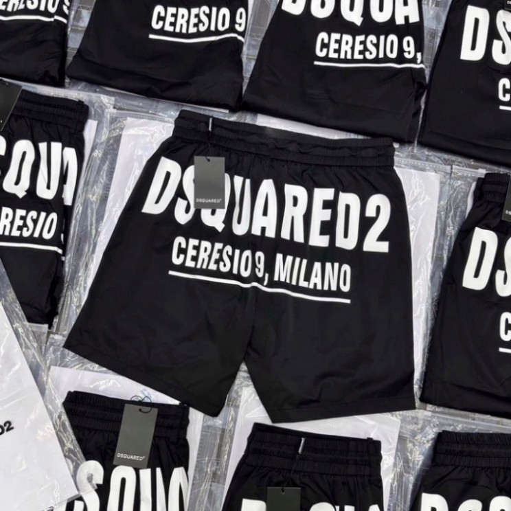 男士風褲 Dsq2 純黑色印花 Dsquared2 Milano 白色背面。 2023 年海灘男孩旅行短褲